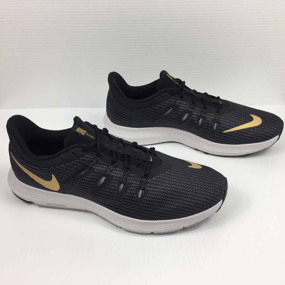 Nike Quest in Black and Metallic Gold NEW
